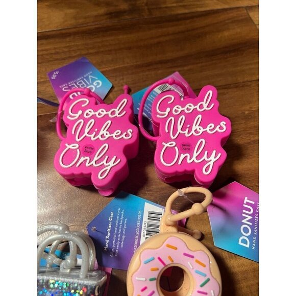 Lot of 6 hand sanitizer cases.  Good vibes, hat, bag, donut, melon - Picture 2 of 6
